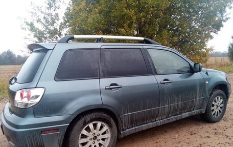 Mitsubishi Outlander III рестайлинг 3, 2004 год, 700 000 рублей, 3 фотография