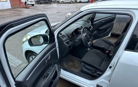 Suzuki Swift IV, 2011 год, 899 000 рублей, 18 фотография