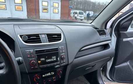 Suzuki Swift IV, 2011 год, 899 000 рублей, 29 фотография