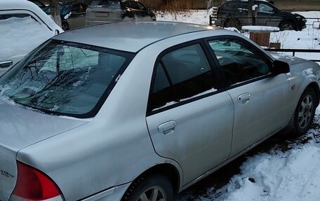 Ford Laser IV, 2001 год, 199 000 рублей, 4 фотография