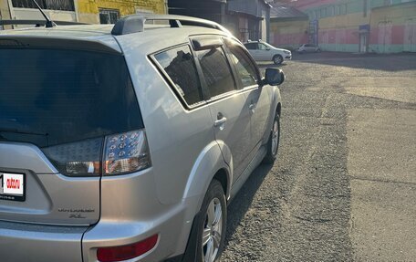 Mitsubishi Outlander III рестайлинг 3, 2011 год, 1 050 000 рублей, 4 фотография