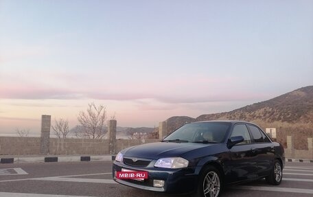 Mazda Familia, 2000 год, 305 000 рублей, 13 фотография