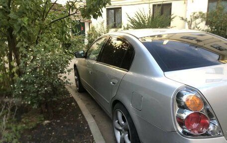 Nissan Altima III (L31) рестайлинг, 2001 год, 300 000 рублей, 11 фотография