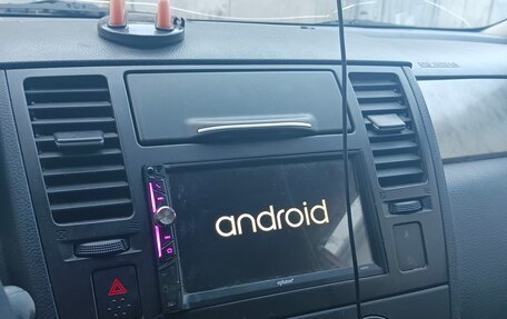 Nissan Tiida, 2010 год, 590 000 рублей, 6 фотография