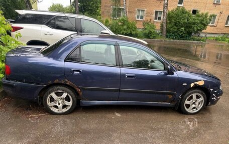 Mitsubishi Carisma I, 2002 год, 100 000 рублей, 13 фотография