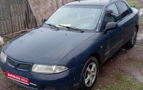 Mitsubishi Carisma I, 1997 год, 150 000 рублей, 1 фотография
