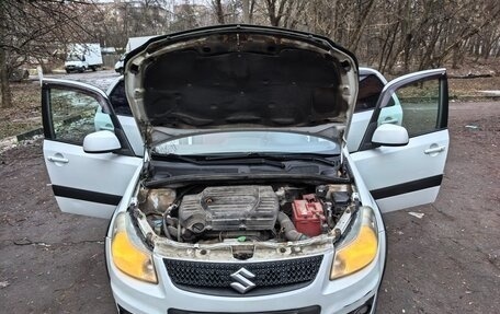 Suzuki SX4 II рестайлинг, 2011 год, 675 000 рублей, 27 фотография