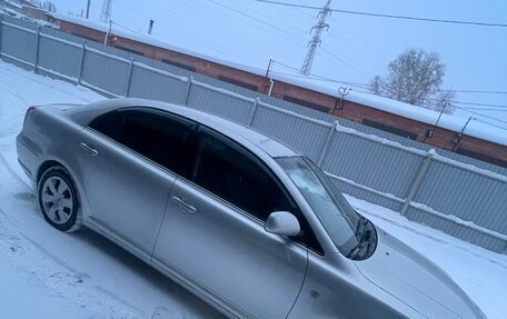 Toyota Avensis III рестайлинг, 2003 год, 720 000 рублей, 8 фотография