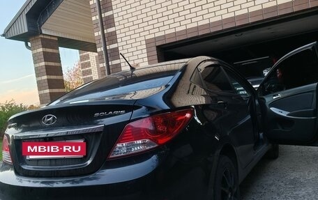 Hyundai Solaris II рестайлинг, 2011 год, 730 000 рублей, 4 фотография