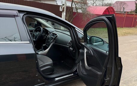 Opel Astra J, 2011 год, 16 фотография