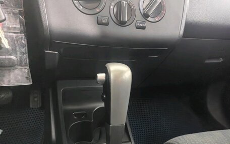 Nissan Tiida, 2012 год, 599 476 рублей, 27 фотография