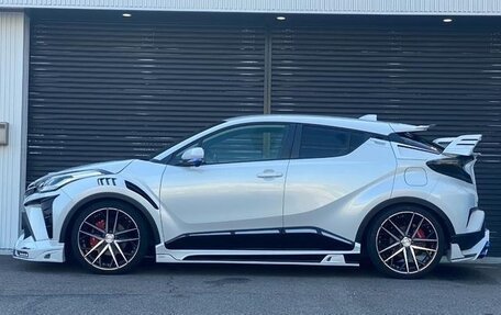 Toyota C-HR I рестайлинг, 2023 год, 2 700 000 рублей, 2 фотография