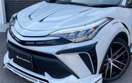 Toyota C-HR I рестайлинг, 2023 год, 2 700 000 рублей, 9 фотография
