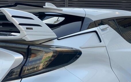 Toyota C-HR I рестайлинг, 2023 год, 2 700 000 рублей, 21 фотография