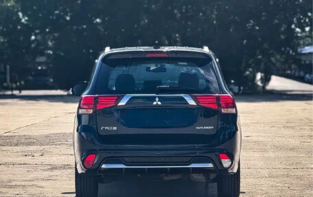 Mitsubishi Outlander III рестайлинг 3, 2021 год, 1 800 666 рублей, 6 фотография