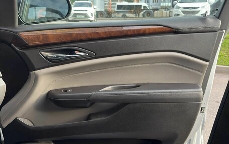 Cadillac SRX II рестайлинг, 2011 год, 1 100 000 рублей, 13 фотография
