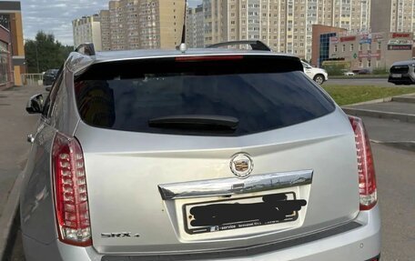 Cadillac SRX II рестайлинг, 2011 год, 1 100 000 рублей, 4 фотография