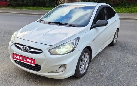 Hyundai Solaris II рестайлинг, 2013 год, 670 000 рублей, 3 фотография