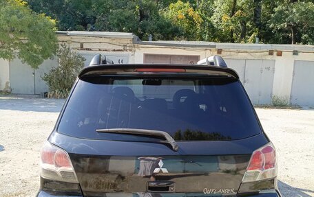 Mitsubishi Outlander III рестайлинг 3, 2003 год, 650 000 рублей, 4 фотография