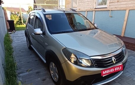 Renault Sandero I, 2012 год, 670 000 рублей, 2 фотография
