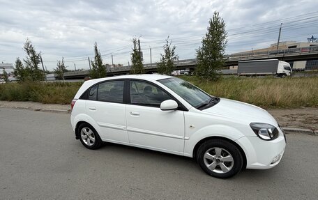 KIA Rio II, 2011 год, 630 000 рублей, 3 фотография