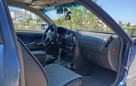 Mitsubishi Colt VI рестайлинг, 2001 год, 260 000 рублей, 9 фотография