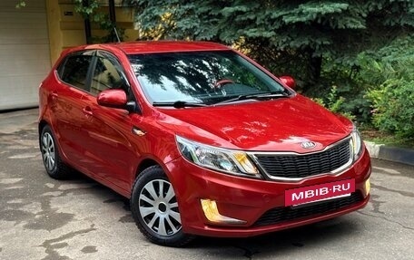 KIA Rio III рестайлинг, 2012 год, 750 000 рублей, 21 фотография