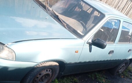 Daewoo Nexia I рестайлинг, 2009 год, 100 000 рублей, 2 фотография