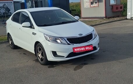 KIA Rio III рестайлинг, 2013 год, 720 000 рублей, 2 фотография