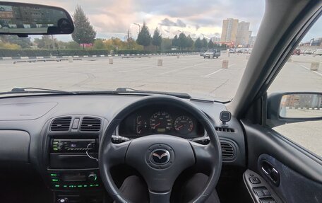 Mazda Familia, 2000 год, 400 000 рублей, 12 фотография