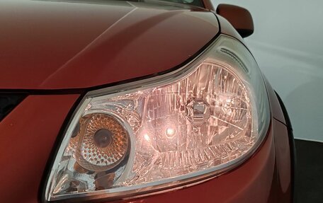 Suzuki SX4 II рестайлинг, 2010 год, 850 000 рублей, 23 фотография
