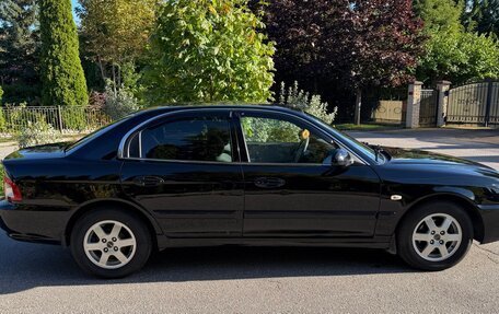 KIA Magentis I, 2005 год, 332 000 рублей, 11 фотография