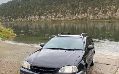 Toyota Caldina, 1997 год, 490 000 рублей, 38 фотография