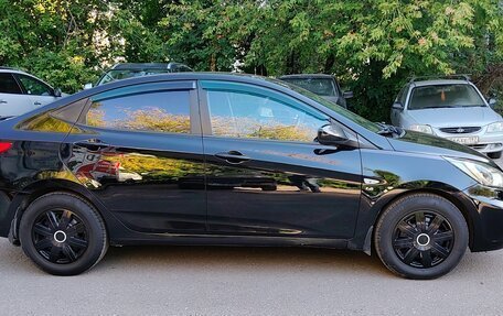 Hyundai Solaris II рестайлинг, 2011 год, 695 000 рублей, 2 фотография