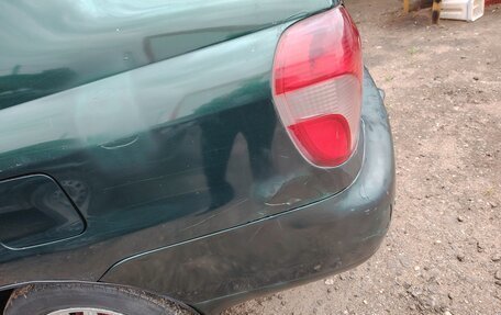 Toyota Yaris I рестайлинг, 2001 год, 150 000 рублей, 16 фотография