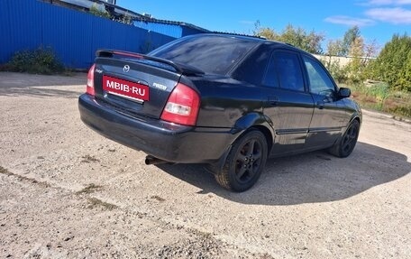 Mazda Protege, 2002 год, 175 000 рублей, 4 фотография