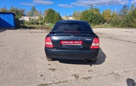 Mazda Protege, 2002 год, 175 000 рублей, 9 фотография
