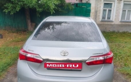 Toyota Corolla, 2014 год, 950 000 рублей, 4 фотография