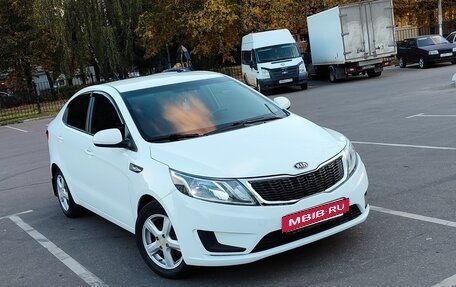 KIA Rio III рестайлинг, 2013 год, 820 000 рублей, 2 фотография