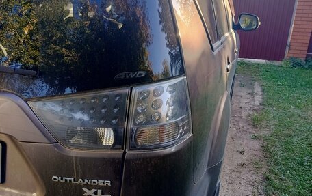 Mitsubishi Outlander III рестайлинг 3, 2011 год, 700 000 рублей, 11 фотография