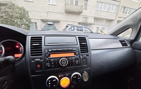 Nissan Tiida, 2010 год, 690 000 рублей, 9 фотография