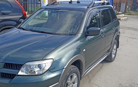 Mitsubishi Outlander III рестайлинг 3, 2006 год, 700 000 рублей, 5 фотография