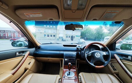Nissan Stagea II, 2003 год, 1 400 000 рублей, 23 фотография