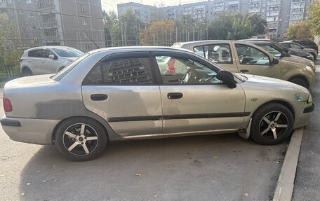 Mitsubishi Carisma I, 2003 год, 230 000 рублей, 5 фотография