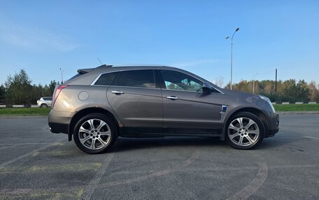 Cadillac SRX II рестайлинг, 2012 год, 1 300 000 рублей, 16 фотография