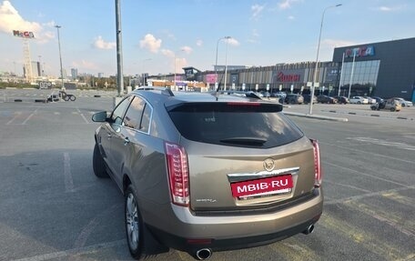 Cadillac SRX II рестайлинг, 2012 год, 1 300 000 рублей, 23 фотография