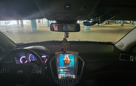 Cadillac SRX II рестайлинг, 2012 год, 1 300 000 рублей, 33 фотография