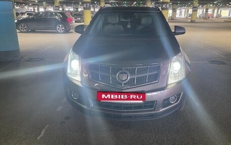 Cadillac SRX II рестайлинг, 2012 год, 1 300 000 рублей, 36 фотография