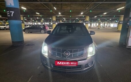 Cadillac SRX II рестайлинг, 2012 год, 1 300 000 рублей, 37 фотография