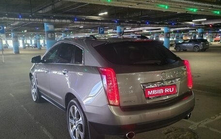 Cadillac SRX II рестайлинг, 2012 год, 1 300 000 рублей, 39 фотография